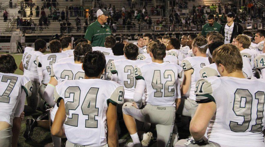 Head Coad Brandon Schmidt gathers the team after a game against Lake Dallas in 2016.