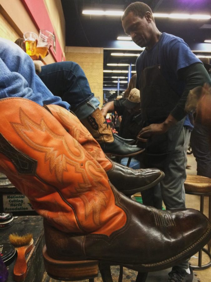 A cowboys boots are shined.