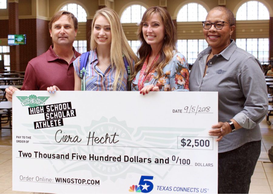 Senior and volleyball player Ciera Hecht accepted a $2,500 scholarship from Wingstop. Hechts teammates as well as administrators came to congratulate her.
NBC-5 also covered the event and aired the package Friday, Sept. 14 at 11 a.m. 