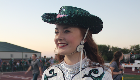 Senior Lieutenant Lizzie Ramsden wears her Talonettes uniform at a football game. The Talonettes practice every day to perfect their halftime performances, which rally support for the football team. “We put so much time and effort into it to put on the best show that we can,” Ramsden said.