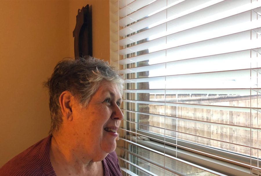 Survivor Sandra Johnson looks out a window as she talks about her battle with breast cancer. In the attached column, Johnsons granddaughter shares her feelings on the diagnosis. I just froze, I sobbed a few tears, and then I faced it. 