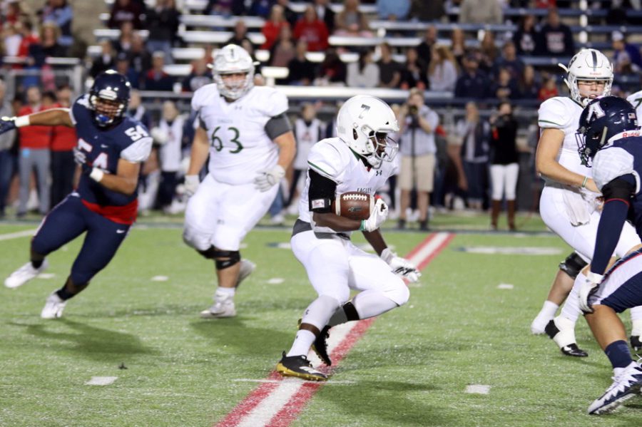 Senior Wayne Anderson, No. 7, fights his way in the back field looking for holes to make a play. He had nine carries for 34 yards during the game. Prosper fell to Allen 54-21. Tonight, the Prosper Eagles face Plano at 7 p.m. in their John Clark Stadium.
