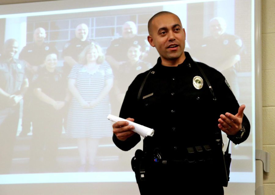 Officer Steve Antonmarchi informs instructor Rod McCalls government class about police procedures. Our primary response is to protect you guys, Officer Antonmarchi said. Were honored to be here, and we are here to serve you guys.
Officer Antonmarchi was a first responder in the 2016 shooting of Dallas police officers.