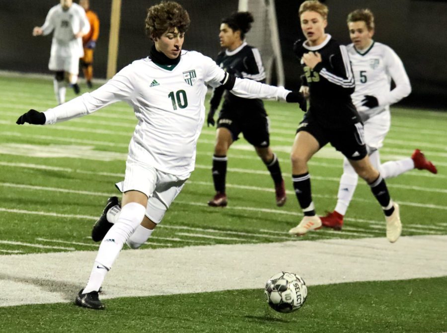 Senior Kason Mullins, No. 10, finds the ball in the midfield. The team won 3-2 against Plano East on Friday, Jan. 25. They will play next, Jan. 29 at 7:30 p.m. at home. 
