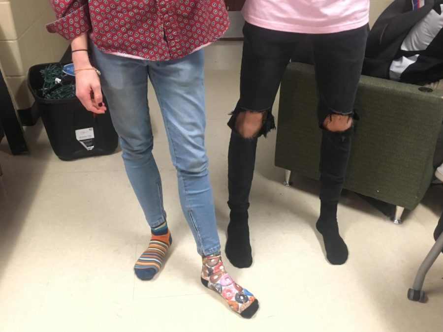 Noah Paape, left, and Reed  Gerritsen,  right, wear no shoes after school. Noah started going shoeless three months ago. After being dress coded, he started a petition to go to school shoeless.