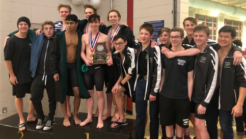 This past Friday PHS Varsity Swim and Dive competed in the 6A District Meet. The boys team, pictured here,  finished second overall with a score of 104.5 closely behind Plano Wests 115. The girls team finished sixth overall with a score of 58 points. Altogether, we had 19 swimmers post 34 best times, and all five divers post best scores, coach Sarah Milne said. And, we also broke five school records at this meet.