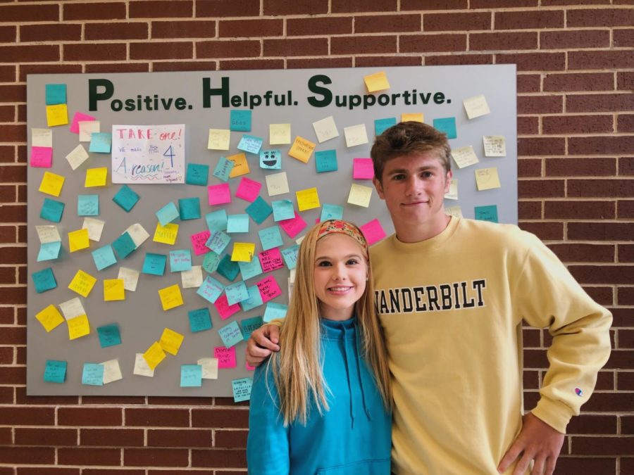 Hope Squad members McKinley Bownds and Jack Simonini pause for a moment in front of the Kindness Wall. The students in this new program at the high school are in charge of keeping the board restocked with positive messages. Students can take an encouraging note whenever they need one, or they can pass by it. “I feel that being on Hope Squad is really going to open my eyes,” sophomore  member Jordyn Leggiere said. “It will make me happy by being able to help people, and to remind them that they aren’t alone, and that they matter so much.”