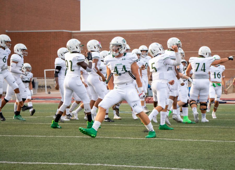 Junior Aidan Siano, No. 44, gets ready during warm-ups before the football game at Flower Mound Friday night Sept. 13. The Prosper Eagles beat Flower Mound with a score of 57-34. The team is currently 3-0, and they will take on McKinney High school Sept. 20 at McKinney, starting 7 p.m. 