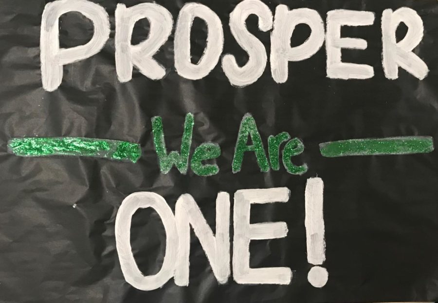 A poster marking the words Prosper, we are one! made by the cheerleaders hangs on the wall. The Prosper Homecoming dance will be held at Prosper High School on October 19, 2019. Students may participate in dress-up days Tuesday, Oct. 15 - Friday, Oct. 18. Check out this brief on information about the week. 