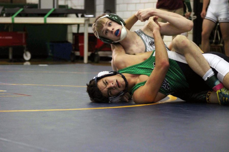 Prosper Wrestling competes against Eaton High School. Junior Austin Gordon takes down an Eaton ISD wrestler.  
Ive wrestled for almost my whole life and wrestling has always been there for me, everyone on the team is like my family and they keep me going, Gordon said. 
