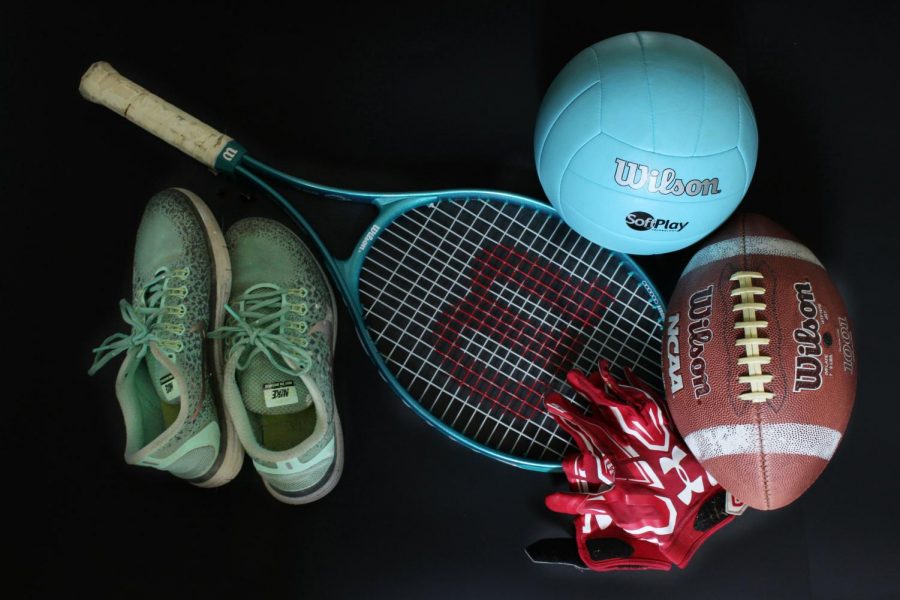 A tennis racket, volleyball, football, running shoes and gloves wait to be used by high athletes. The University Scholastic League took action today, July 21, to delay fall sports for 5A and 6A conferences, including volleyball, football, tennis and cross country. The first competions for each sport will not occur for at least five weeks. UIL is tasked with making difficult decisions for all student athletes across Texas, soon-to-be superintendent Holly Ferguson said. They have proven to continue to base their decisions on facts while also remembering how many student athletes, coaches, and parents are depending on them to do their best. They have proven throughout the presence of the virus that they are up for the challenge.