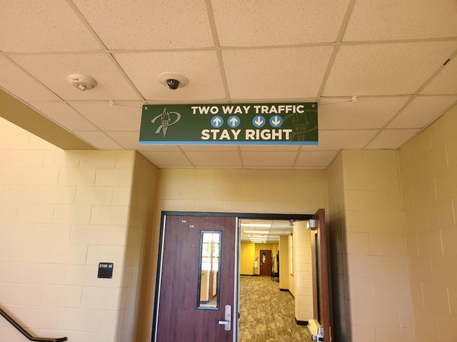 Signs throughout the school hallways announce the flow of traffic. Students are advised to stay to the right in hallways, which will help a faster flow of traffic and encourage social distancing. Students should also sanitize their hands when entering and exiting a classroom.