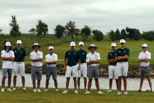 The varsity boys golf team lines up after competing in their tournament at Frisco Lakes Golf Club. The boys Varsity I team placed 2nd overall, with players Landon Bownds placing fourth individually and Case Randle placing fifth. We placed second and third while  also hitting tons of fairways and green, varsity player and senior Austin Davis said. Our putting could have been a lot better. The greens were just inconsistent.