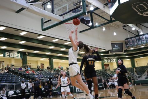 After rushing to the lane, junior Ayden Allen jumps with the ball. Prosper has a current record of 1-1. They won their first game against the Wylie Pirates 45-44.