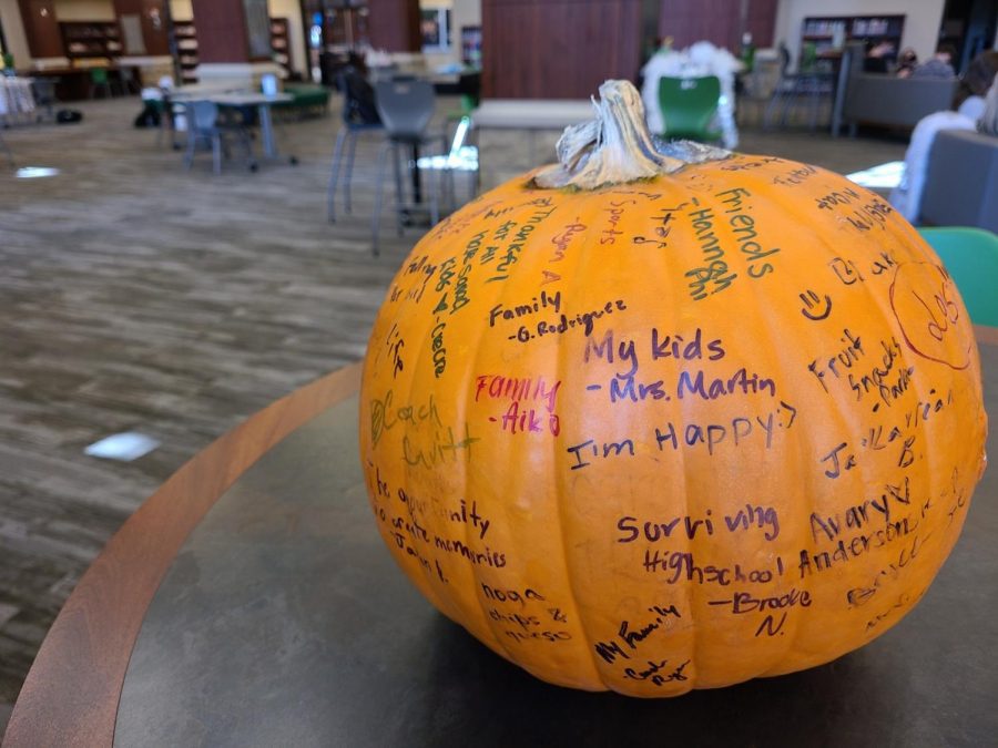 Greeting+students+that+enter+the+Nest%2C+the+annual+Hope+Squad+pumpkin+shows+off+student+signatures.+The+pumpkin+is+used+for+students+to+express+what+they+are+grateful+for+this+year.+Thanksgiving+break+will+start+Nov.+23%2C+and+school+will+return+Nov.+30.