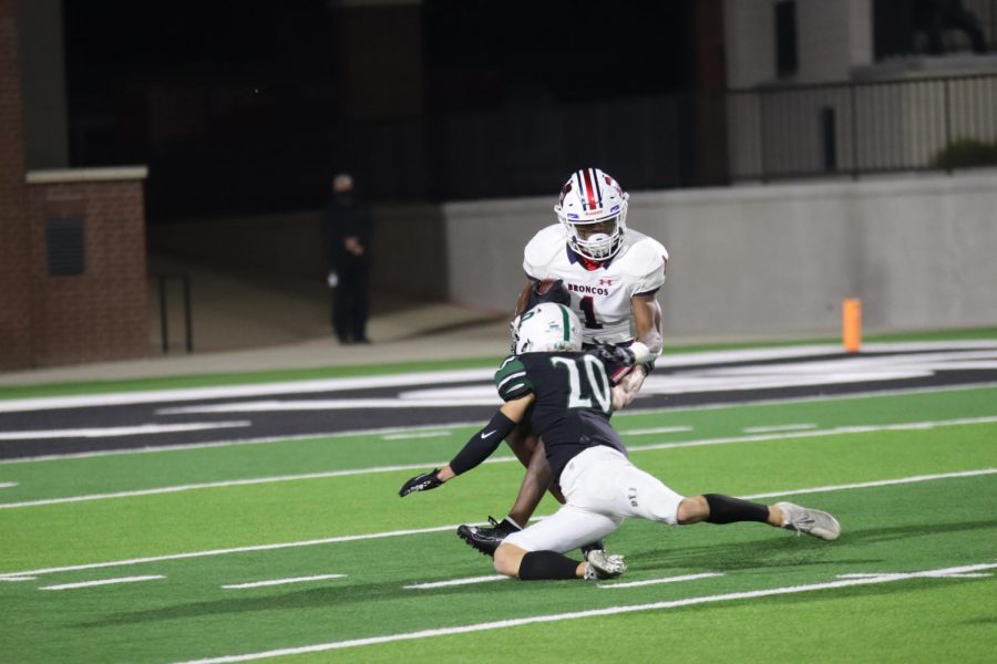 Diving into a McKinney player, senior James Duvall makes a tackle. In the state of Texas, the Eagles are ranked No. 59. Prosper will play Marcus in the playoffs Dec. 12. Kickoff will be at noon at Flower Mounds Neil E. Wilson Stadium. 