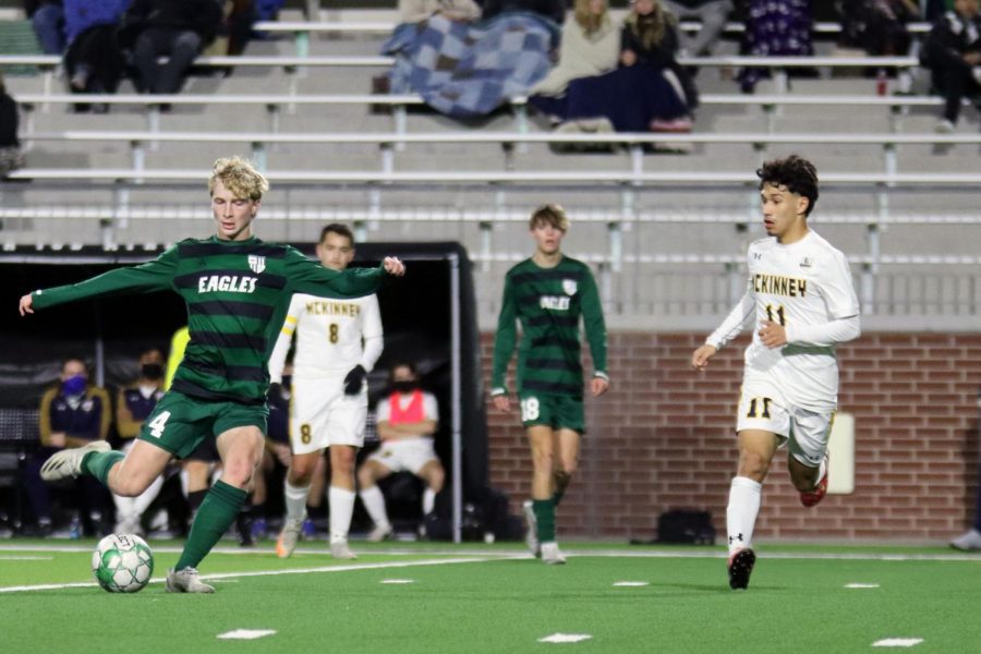 Looking to make a pass, junior Grady Coker drives the ball. Coker is a midfielder for the varsity team. Luce Prospect Group interviewed Coker to highlight him as a recruitment prospect.