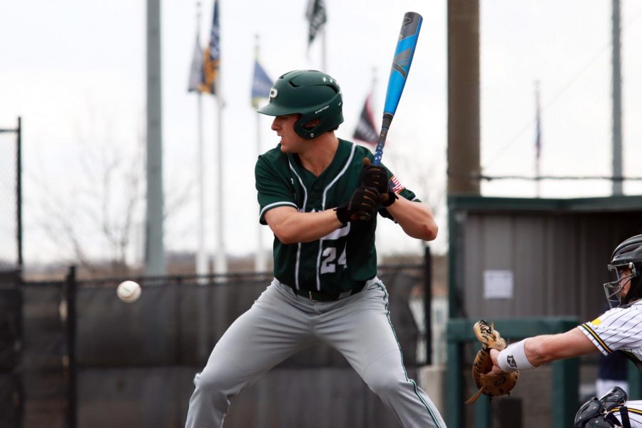 Waiting+for+the+ball%2C+junior+Jacob+Devenney+prepares+to+swing+his+bat.+Devenney+is+a+two+sport+athlete%2C+playing+on+both+varsity+baseball+and+football.+Devenney+has+committed+to+play+baseball+at+Rice+University+in+the+fall+of+2022+after+he+graduates+from+Prosper.