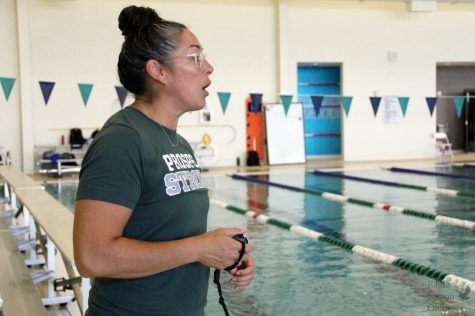 Timer in hand, head swim coach Lena Harrington gives directions to swimmers in the pool before their timed practice. This is Harringtons first year at Prosper leaving Plano ISD after nine years. “I sat and got to speak with Coach Little, Coach Schmidt and Coach Sacco, all the coaches,” Harrington said. “It just felt like home.