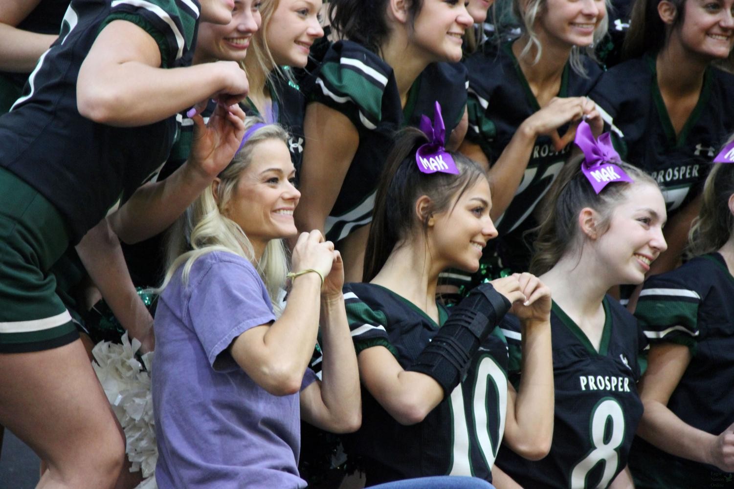 Eagle Nation Online | JV cheer coach defines leadership through coaching,  teaching