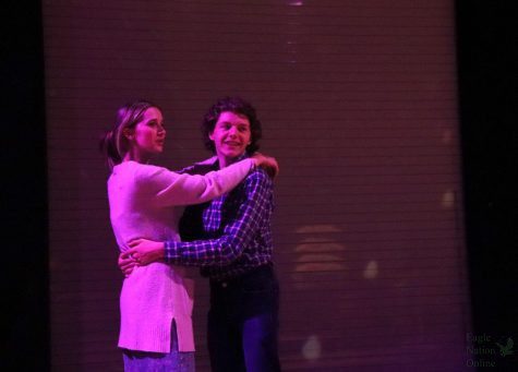 As they move below disco ball, juniors Madeleine Wentz and Cooper Smith slow dance during the show. Kodachrome, a production by the theatre department, will open on Oct. 14. The shows will take place in the Black Box. 