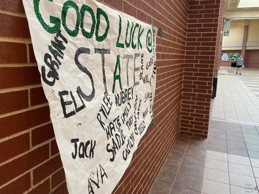 A poster sits in the main hallway wishing cross country good luck at their state meet. The boys and girls varsity teams  will compete at the UIL State Championship Saturday, Nov. 6. The school held a send-off Friday, Nov. 5 for the team.