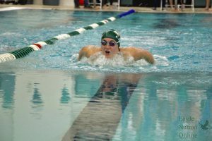 Taking a deep breath, junior Morgan Frazier prepares to take her next stroke. The girls team also went up against Plano East Dec. 8. Their next meet will be held Wednesday, Jan. 12, at the PISD Natatorium against Rock Hill High School.