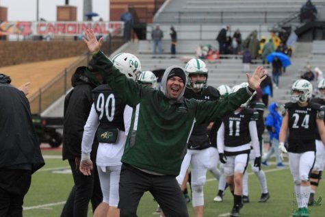 Right after the win, assistant coach Coby Richards celebrates. The game was held in Lubbock at Lowry Field against El Paso Eastwood. The team will face Denton Guyer at Allen, Saturday, Dec. 4, at 1 p.m.
