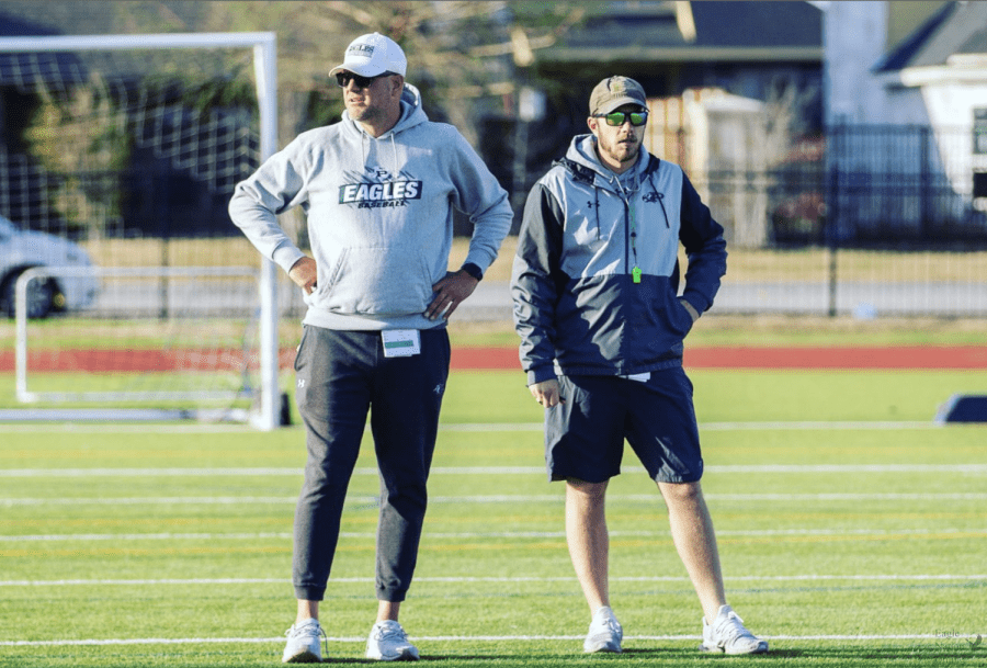 Discussing+plays%2C+coaches+Jeff+Pevehouse+and+Reed+Ryan+watch+the+spring+football+practice.+The+team+began+their+periodic+early+practices+at+7+a.m.+in+preparation+for+the+Spring+Game+on+Saturday%2C+May+14.+The+game+will+be+played+at+Childrens+Health+Stadium+at+Prosper+ISD.
