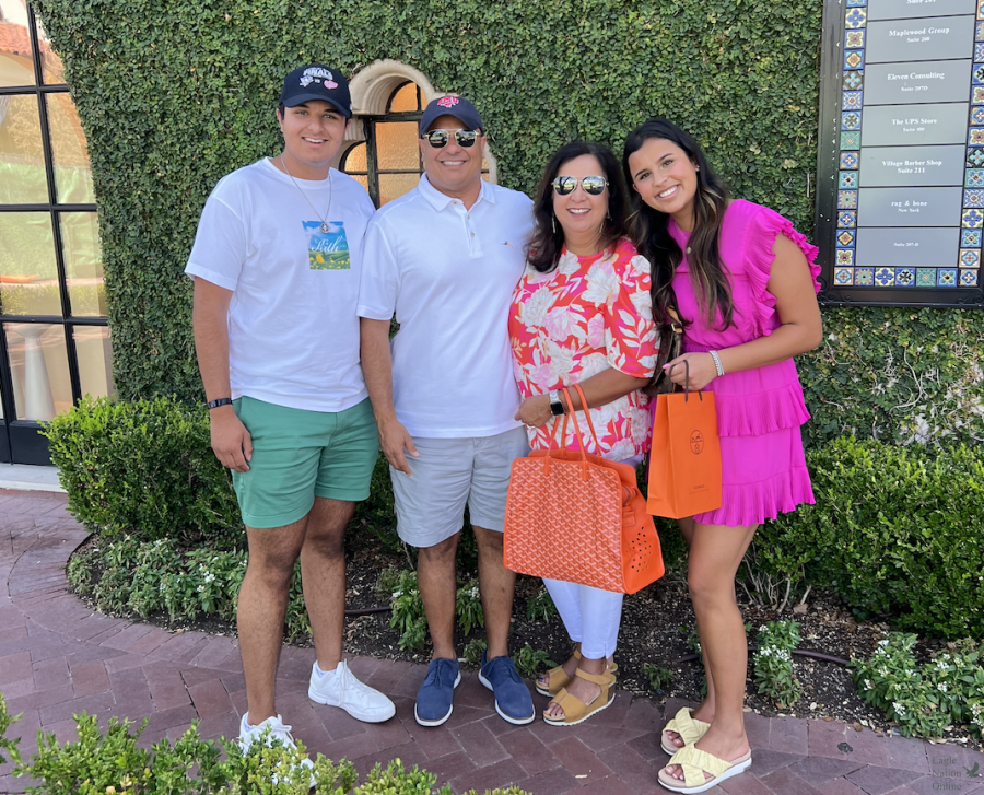 During a trip to Highland Park Village, senior Neena Sidhu, on the far right, gathered with her family. Neenas brother, Sam, far left, will attend Southern Methodist University as a freshman. I love spending time with my family, Neena said. Going out with my family is something we do often.