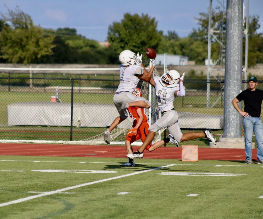 Running up for the catch, freshmen Hayden Messer and Hayden Rychel jump up with eyes on the ball. This marked their third play of the season. The next freshman game is Thursday, Sept. 15. 