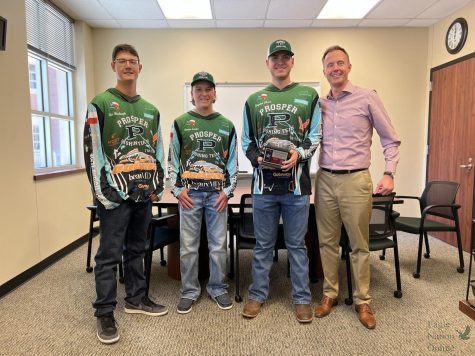 Pictured above are fishing team members Ben Hurbough, Carter Evans, Hayden Chase alongside their coach. The Prosper fishing team presented their first-place trophy to Mr. Jones Oct. 20. The team brought in 1st out of 49 other high schools in the North Texas Division; the total teams were 240. This was on Lake Lewisville. The team will be meeting tonight, and their next tournament is Nov. 12 on Lake Ray Roberts. 