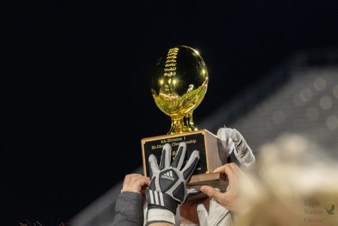 In celebration of their win, the team lifts the gold ball trophy into the air. Prosper won the bi-district game, and now will move on to play South Grand Prairie on Nov. 18 at Choctaw Stadium. The game on Nov. 11 resulted in a score of 28-3.