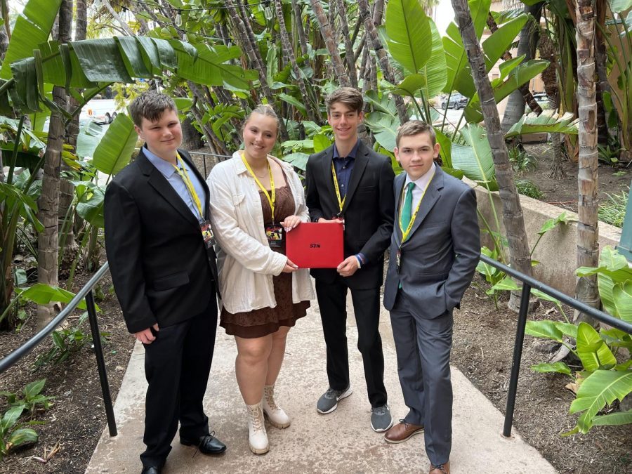 Freshman Colton Boston, sophomore Christina Krasnova, junior Coleman Meier and sophomore William Norris hold their award. The audio/video trifecta of Eagle Nation News (ENN), PHS The Talon radio and Eagle Production Group (EPG) brought home multiple awards from the 2023 Student Television Network Conference. The conference was held in Long Beach, California.