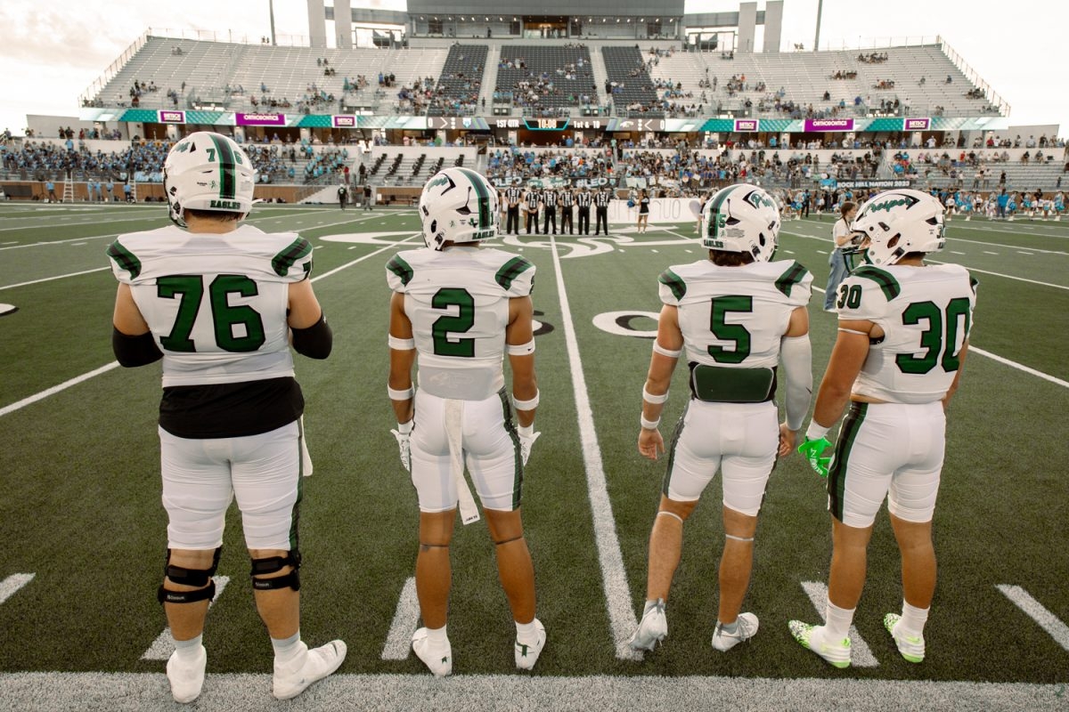 Eyes forward, the 2023 Prosper Eagle Football team captains line up for the coin toss. According to their coaches, seniors Tyler Mercer, Terrence TJ Jones, Jonah McClendon, and Davis Perkins lead both on and off the field alongside QB1, senior Nate TenBarge. “(After the Rock Hill game,) I saw that we can’t get big-headed, McClendon said. We need to come out punching in order to win the game (against Little Elm tonight). 