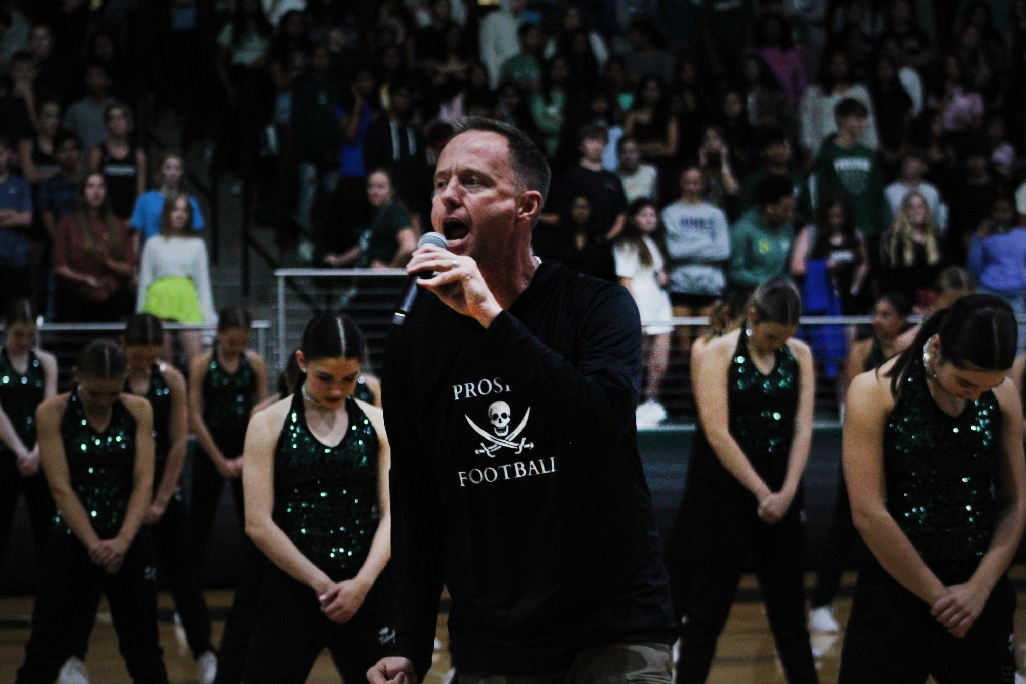 During the pep rally, Principal Nick Jones gets ready to introduce The Talonettes. This is PHSs second pep rally. The next five will be held throughout the football season.   