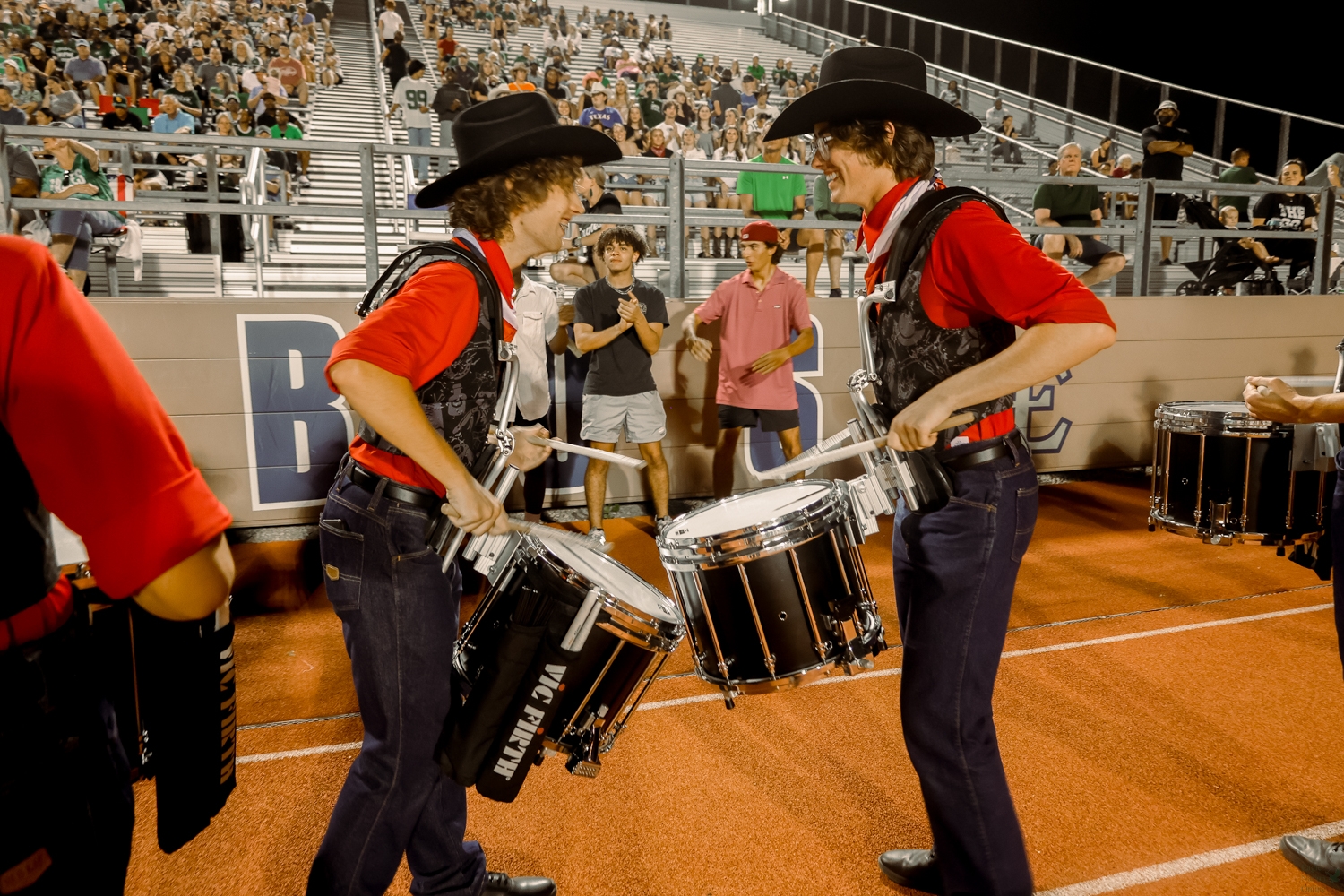 Playing with enthusiasm, seniors Alistair Hickman and Jake Kinchen beat on their drums. The Mighty Eagle Band brings the drumline in front of the student section at the beginning of every 3rd quarter, to bring extra excitement to the crowd. The band performed their Deep In The Heart of Texas performance on Saturday Sept. 30, placing first in the grand championships. The accomplishment was last achieved by the Eagles in 2018.