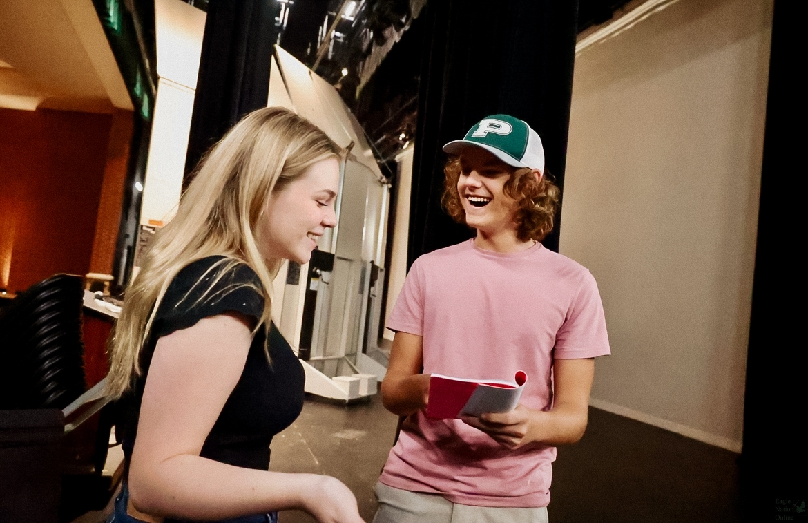 As he rehearses a scene with junior Averie Benson, junior Aiden Hansen prepares for his next line. Hansen has played a lead role in various school plays, including SpongeBob in SpongeBob the Musical and Marius in Les Miserables. Hansen will next be playing Elijah in Moby Dick, which opens on Oct. 18 and will continue through Oct. 20.