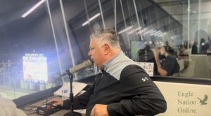 As he looks out to the field, Eric Manto prepares to announce the next play. Manto is the official announcer for PISDs Childrens Health Stadium. He is also known as the voice of Prosper. Manto announces at every home game including all of the varsity football games for PISD high schools. 
