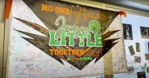Filled with signatures, a banner is displayed in Jaxson Littles hospital room. The banner includes the hashtag #littlestrong which became used by members around Prosper to show their support for Jaxson through social media. Jaxson is number five on Prospers junior varsity basketball team. 
