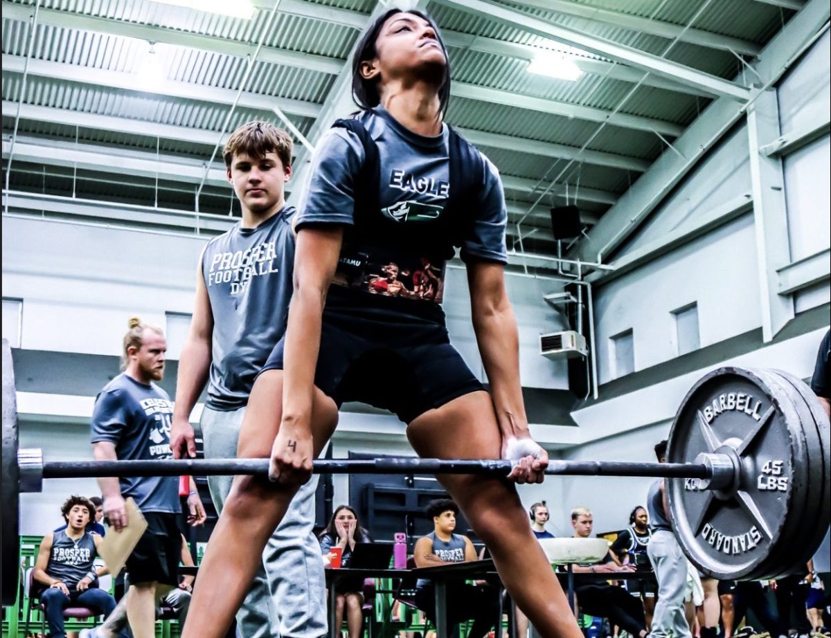 Pulling+315+pounds%2C+senior+Juliana+Cruz+sets+a+new+high+school+record+for+the+114+weight+class.+Im+grateful+for+the+team+I+chose+to+be+on+and+the+coaches+that+invested+in+me%2C+even+through+my+crybaby+moments%2C+Cruz+said.+The+Lady+Eagle+Powerlifting+team+will+always+be+unforgettable.+%28Courtesy+of+Isabelle+Oathout%29