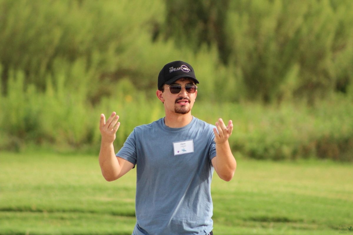 As he directs the tubas, senior Hank Carbajal sets up for another rep. This is his fourth year in the band program. "The hardest part about band camp I would say is the heat," Carbajal said. "It really gets to you when you when you have to wait for directions."