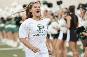 Eyes ahead, senior Hannah Lee runs towards her waterpolo teammates. Lee plays as a goal keeper. Lee currently averages 5.5 saves per game. She is also part of the varsity swim and dive team. 