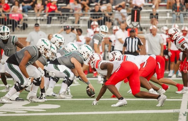 Moments before the ball is snapped, Prosper's offensive line sets up on the line of scrimmage. This offensive line includes senior Logan Cahill who is committed to play Division I football at Sam Houston State University. "My biggest take away from the game was that as a team we have the capability to be great," Cahill said. "I believe and I am all in for this team working and bonding together through the thick and thin. We need to stay locked in this season on both sides of the ball."