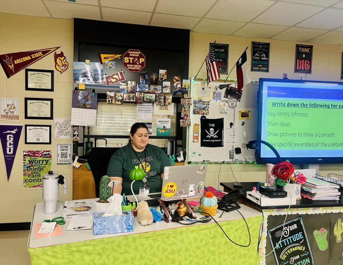 As she prepares for her first class, Launa White finalizes her lesson for the day. She's an AP Biology and Honors Biology teacher. “You have to have a lot of patience to go into teaching in general," White said. "You also have to have a passion for science and a passion for kids wanting to help them find their place in the world."