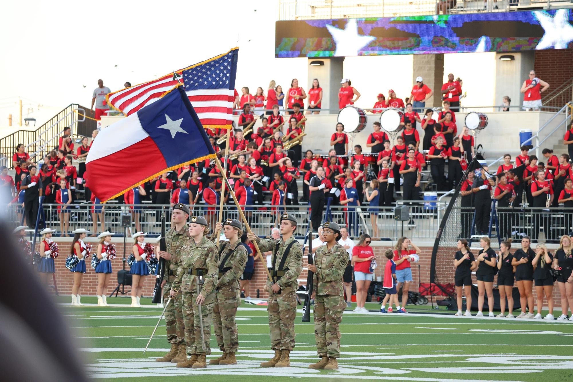 The JROTC Color Guard marches with the American and Texas flags during halftime at the Prosper Homecoming football game. 1st Sgt. Sedric Wade and Staff Sgt. Michael Songy teach the class. This class includes Cadet Sgt. Maj. Brooklyn Spring, Cadet 2nd Lt. Christian Politz, Cadet Cpt. Jolee Page, Cadet Cpt. Christopher McHenry and Cadet 2nd Lt. Pravani Sundaram.