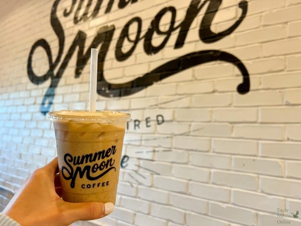 Autumn Moon Latte in hand, senior Erica Deutsch visits a local coffeeshop, Summer Moon. Deutsch reviewed several coffee shops regarding their fall signature drinks. The list includes Summer Moon, Starbucks, Fourteen Eighteen, Heirloom Haul and Lemma.