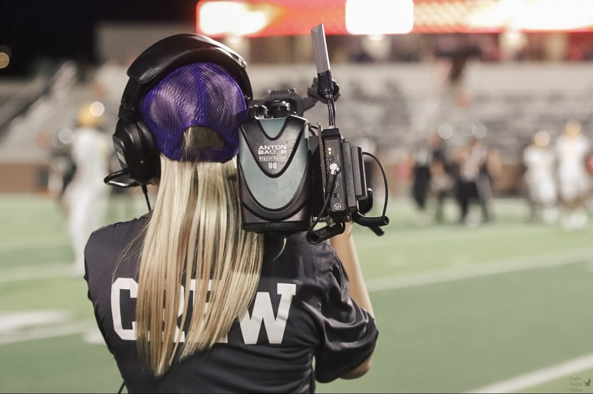 Eyes ahead, junior Cali Swick follows the play on the field. It teaches me responsibility. This is Swick's second year in the stadium crew program. "It teaches me a better understanding of equipment and the way that things roll at a stadium," Swick said. "The relationships that you make with everyone are just so pure because you're helping each other out."