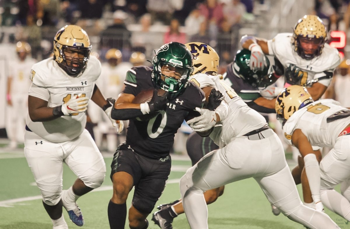 Ball tucked, senior Leo Anguiano rushes for a first down. Prosper is undefeated in district and ranks 19th in the state of Texas. "Fridays game was definitely a tough one," Anguiano said. "I’m mostly proud of the way we handled adversity as a team. We showed that we don’t back down from a fight. In close games we’ll find a way to win and that’s gonna come in handy this week against Allen."