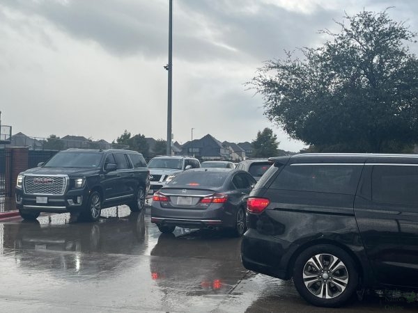 Outside of the MPF, cars line up in the parking lot to escape the rain. Traffic was formed due to the traffic patterns and the number of cars in the parking lot. An announcement for upperclassmen to leave early was made in an attempt to prevent traffic, but traffic formed regardless. 
